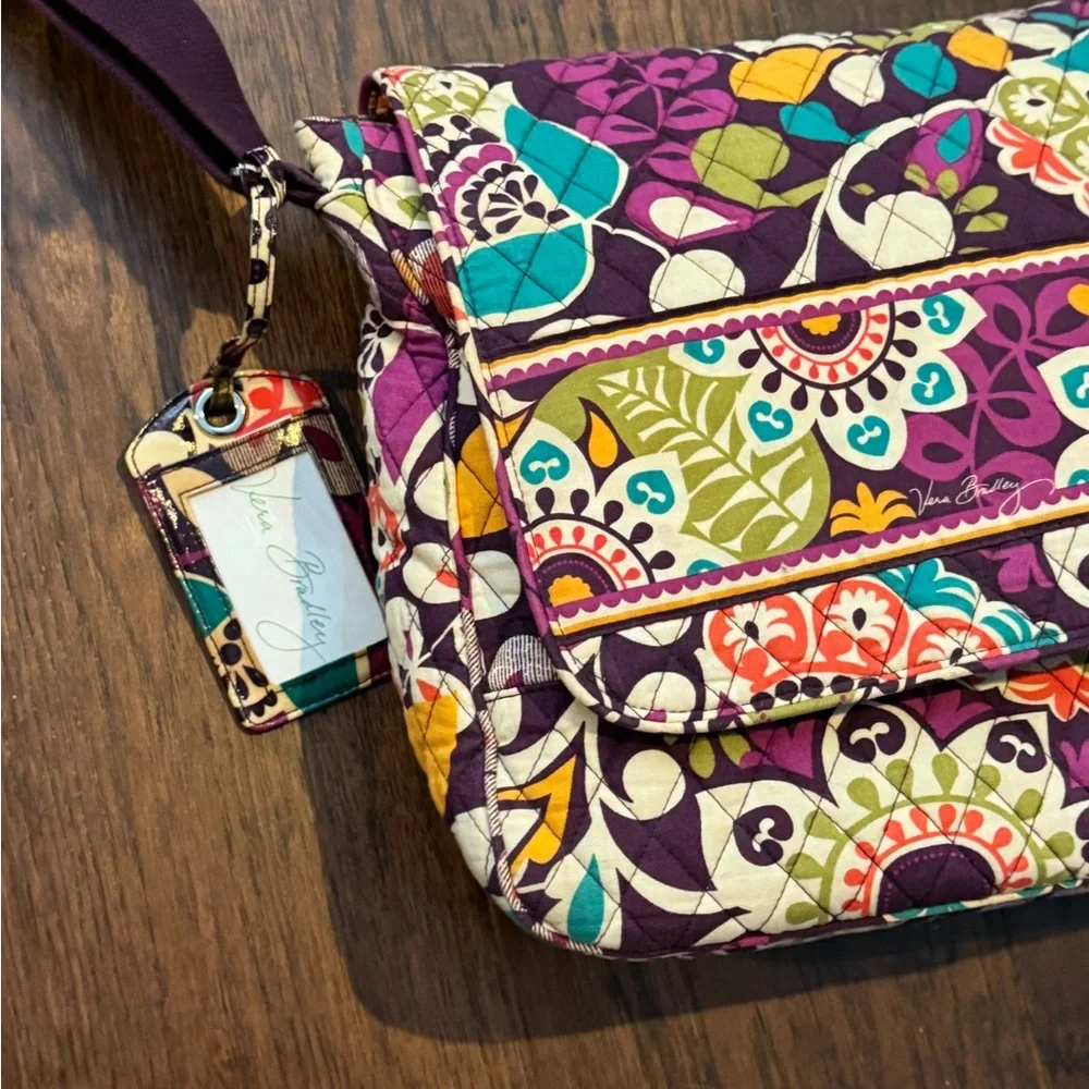 Vera Bradley Retired Messenger/Computer Bag in the Plum Crazy pattern.